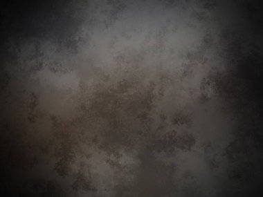 desenli yüzeyi olan koyu bir arkaplan