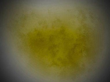 Siyah arkaplanda sarı bir madde