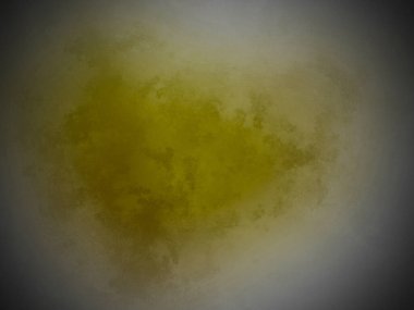 Siyah arka planda sarı bir madde.