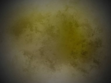 Siyah arka planda sarı bir madde.