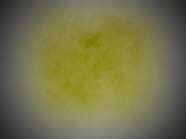 Sarı ve siyah bir arkaplan ve sarı bir daire.