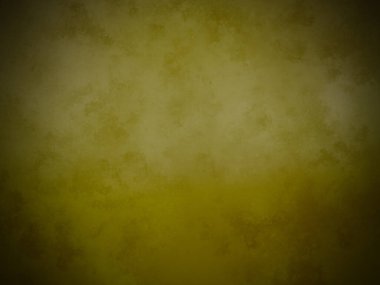 Üzerinde saat olan sarı ve kahverengi bir duvar.