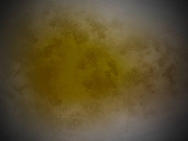 Siyah arkaplanda sarı bir madde