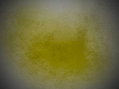 Beyaz arkaplanda sarı bir madde