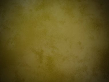 Siyah arkaplanı olan sarı bir duvar.