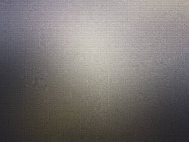 fırçalanmış bir yüzeyi olan metal bir yüzey