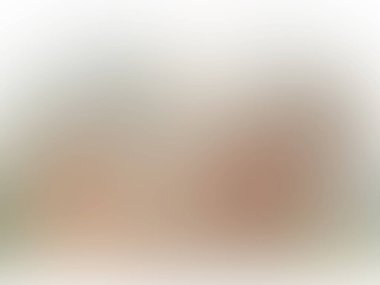 abstract pastel soft colorful smooth blurred textured background off focus toned in gold color