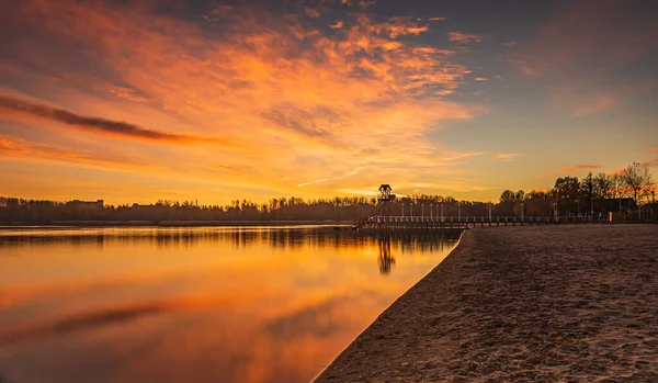 Pogoria lake bathed in the light of the rising sun.