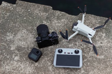 drone quadrocopter on a tripod clipart