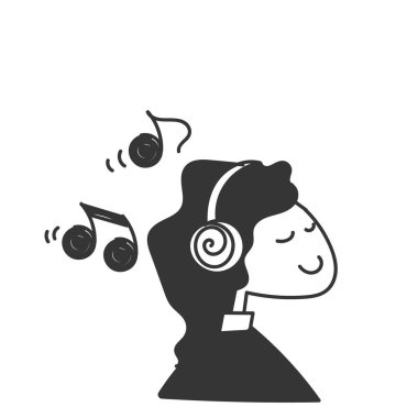 Kulaklıkla müzik dinleyen karalama yapan kadın