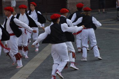Basque folk dancers in a street festival in the old town of Bilbao, capital of Biscay, Basque province of Spain