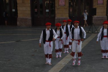 Basque folk dancers in a street festival in the old town of Bilbao, capital of Biscay, Basque province of Spain