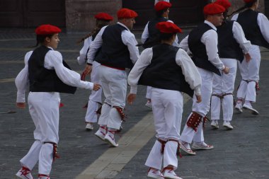 Basque folk dancers in a street festival in the old town of Bilbao, capital of Biscay, Basque province of Spain