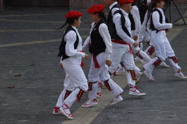 Basque folk dancers in a street festival in the old town of Bilbao, capital of Biscay, Basque province of Spain