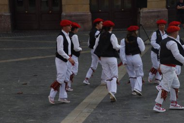 Basque folk dancers in a street festival in the old town of Bilbao, capital of Biscay, Basque province of Spain