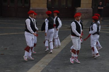Basque folk dancers in a street festival in the old town of Bilbao, capital of Biscay, Basque province of Spain