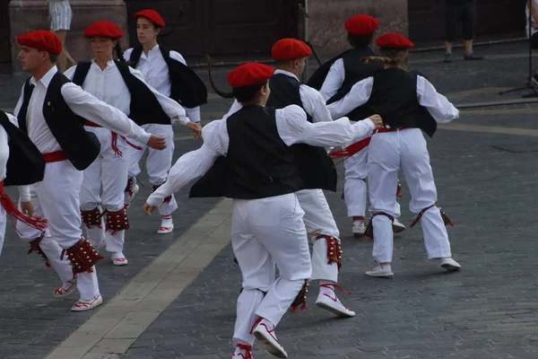 Basque folk dancers in a street festival in the old town of Bilbao, capital of Biscay, Basque province of Spain