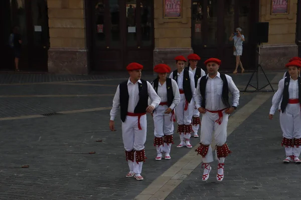 Basque folk dancers in a street festival in the old town of Bilbao, capital of Biscay, Basque province of Spain