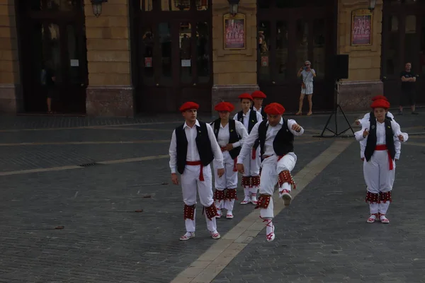 Basque folk dancers in a street festival in the old town of Bilbao, capital of Biscay, Basque province of Spain