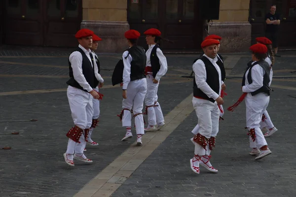 Basque folk dancers in a street festival in the old town of Bilbao, capital of Biscay, Basque province of Spain