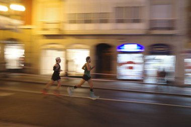 Night marathon in Bilbao, Spain clipart