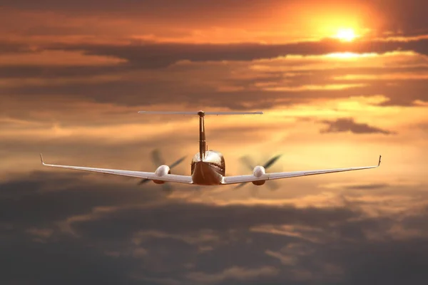 Prywatny Samolot Lecący Zachodzie Słońca Obrazy Stockowe bez tantiem