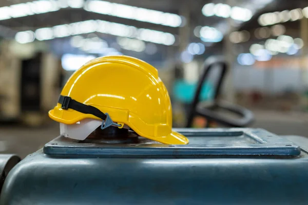 Yellow and helmet or hard hat for head safety in industry factory. equipment safe of worker construction. Futuristic industry production manufacturing.