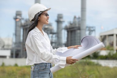 Elektrik enerjisi üreten, planlı çalışan bir mühendis. Petrokimya 'da inşaat müdürü petrol rafinerisi. Geliştirme müfettişi Endüstriyel enerji santrali