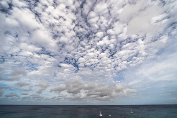 The scenic Caribbean sky over the ocean