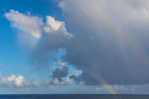 Scenic view at rainbow and clouds in the Caribbean