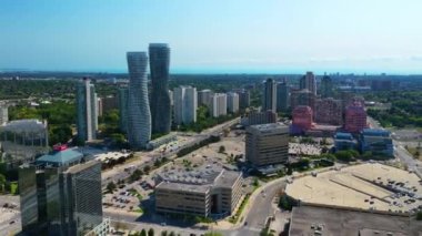 Mississauga, Ontario, Canada- August 12, 2022: Aerial hyperlapse scene of the Absolute World Complex in Mississauga, Ontario, Canada 4K