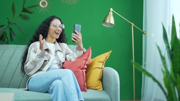 Pretty Dark Hair Curly Woman Glasses Looking Smartphone Camera Greeting — Stock video