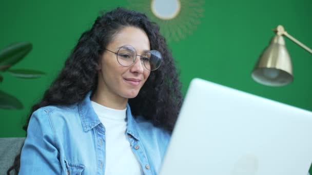 Smiling Curly Girl Freelancer Working Laptop Checking Email Surfing Web — Stock Video
