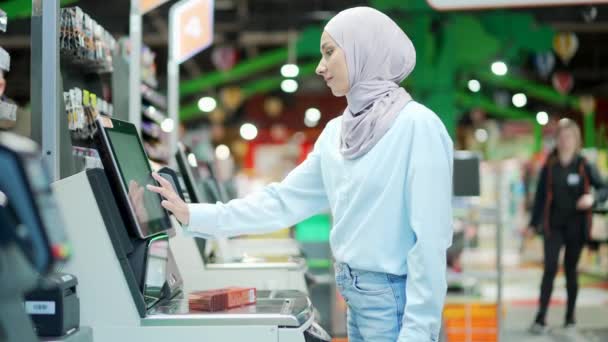 Female Buyer Using Self Service Cashier Checkout Supermarket Customer Scanning — стоковое видео