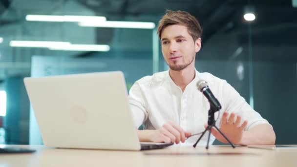 Handsome Man Microphone Looks Laptop Records Podcast Cheerful Successful Young — Wideo stockowe