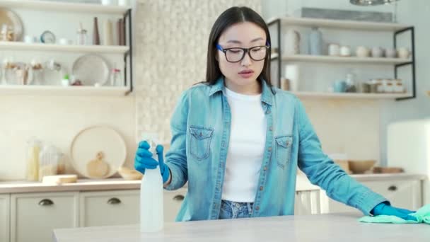 Tired Young Asian Woman Cleaning Kitchen Home Female Rubber Gloves — Stockvideo