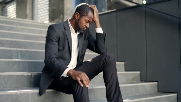 Sad African American Mature Man Sitting Steps Office Building Middle — стокове відео
