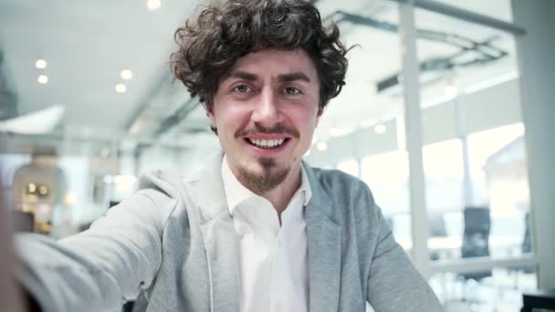 Camera View Smiling Friendly Young Business Man Freelancer Looking Camera — Vídeo de Stock