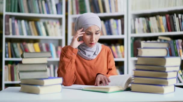 Tired Confused Muslim Female Student Hijab Studying Reading Books Campus — Stock Video