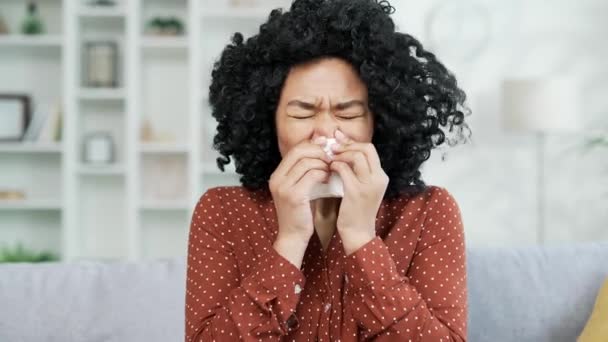 Close Young Sad African American Female Allergy Sneezes While Sitting — Stock Video