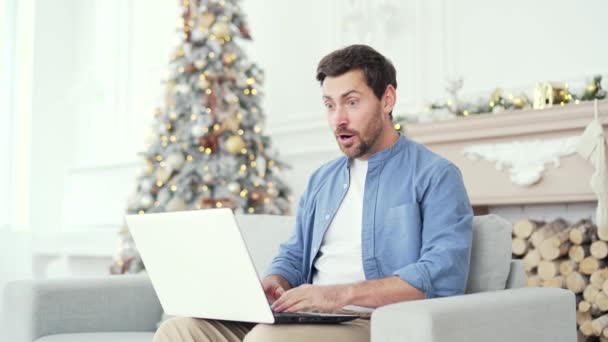 Happy Excited Man Received Great News Laptop While Sitting Sofa — Stock Video