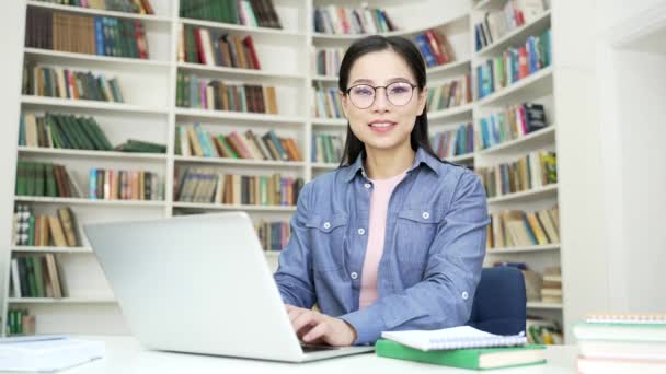 Portrait Smiling Asian Female Student Sitting Desk Working Laptop Campus — Stock Video