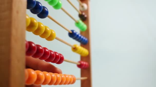 Hand Working Colorful Wooden Abacus Green Background — Vídeo de stock