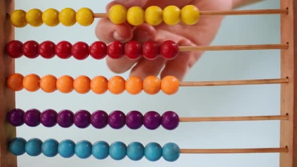 Hand Working Colorful Wooden Abacus Green Background — Stockvideo