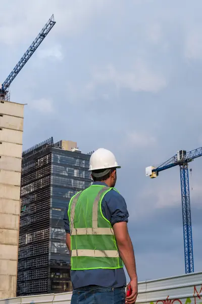 Construction worker back on construction site