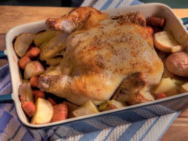 Top View Cooked, Butole Chicken on Butcher Block Surface