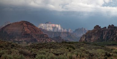 Monsoon clouds pass through Zion National Park and the West Temple at Cave Valley, Utah clipart
