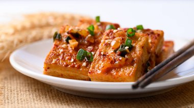 Korean side dish, spicy braised tofu (Dubu Jorim)