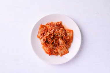Kimchi cabbage on white background, Korean food homemade side dish, Top view