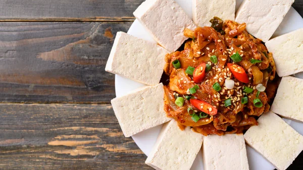 stock image Korean food, Tofu and stir fried kimchi with pork (Dubu Kimchi), Table top view